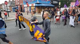 Extinction Rebellion and XR Unify supporters march from Ducketts Common to the