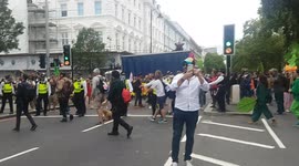 Climate change protesters block road outside of Museum district in London