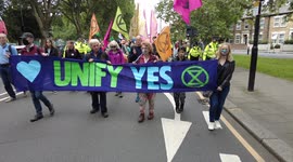 Activist and environmentalist Marvina Newton leads  Extinction Rebellion's Carnival for Climate Justice in London