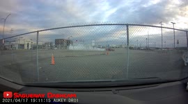 Idiot driver doing a burnout on the streets