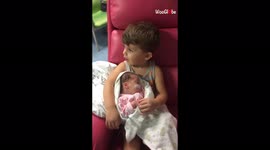 Toddler comforts newborn premature sister by singing to her in hospital