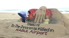 Sand Artist make art for Tribute to innocents killed in Kabul Airport