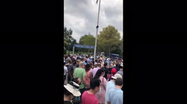 Masked and vaxxed New York tennis fans line up for US Open for over an hour