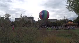 Vauxhall Balloon and vintage carousel entertain visitors of Pleasure Gardens over Bank Holiday weekend