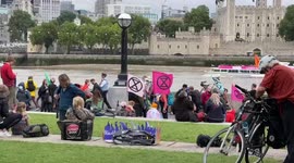 Extinction Rebellion protesters gather outside City Hall, opposite the Tower of London