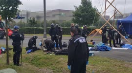 Aylesbury, UK. 31 August 2021. Animal Rebellion blockaded the entrance to Arla Aylesbury with bamboo structures, concrete blocks and a van.