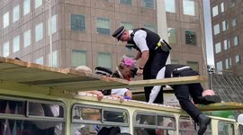 Chaos as police climb onto roof of bus to remove Extinction Rebellion protesters blocking London Bridge