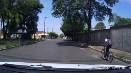 CLOSE CALL: Biker takes blind corner without checking both ways and nearly has head-on collision