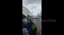 Extinction Rebellion protesters block London Bridge and entrance to Downing Street