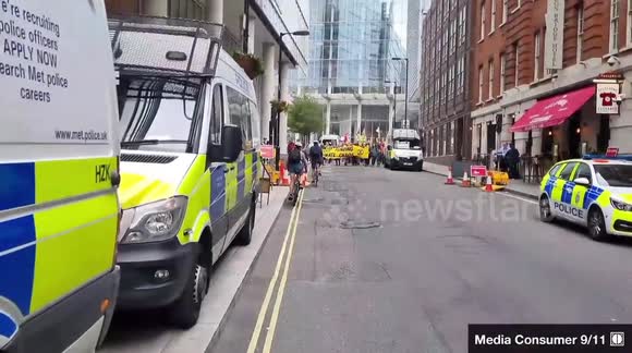 Extinction Rebellion March Through Police Line By London Bridge