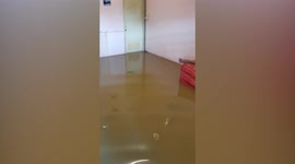 Flash floods swamp homes after heavy rain storm in Thailand