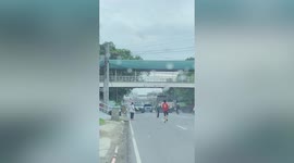 Kind youngster helps pensioner safely cross road