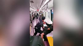 Chinese security guard violently drags woman off train after she argued with passengers