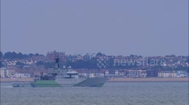 HMS Severn leaves Thames after being recommissioned in new 'dazzle' paint job in Kent, UK