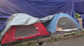 Surviving Pakistani Asylum Seekers Set Up Tents Next to UNHCR Office in Central Jakarta Indonesia