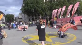 masked Extinction Rebellion STRANGE DANCING IN TRAFALGER SQUARE.