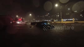 Cars flooded in furious, wind-driven rain in New York following Ida; warnings issued