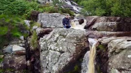 Spectacular lake Vyrnwy waterfall cinematic drone footage from the top