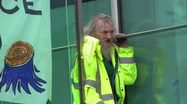 TWO OLD MEN CLIMB THE  HS2 BUILDING IN THAMES ROAD EXSTINCTION REBELLION