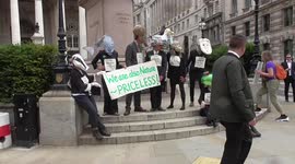 EXSTINCTION REBELLION PROTESTERS WEARING ANIMAL MASKS OUT SIDE THE BANK OF ENGLAND