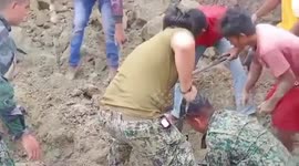 Family survives being buried alive by landslide in the Philippines