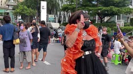 Thai anti-government demo blocks road with giant poster, breakdancing and selfies