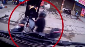 Helmet saves biker's life as he drives head-first into crane arm in southern China
