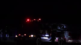 Side View of a Fire Truck at Night in Bloomington MN at Hampshire hills apartments