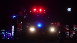 Side View of a Fire Truck at Night in Bloomington MN at Hampshire hills apartments