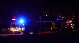 Side View of a Fire Truck at Night in Bloomington MN at Hampshire hills apartments