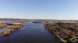 Bright sunny day in a small town with a river phone through it in the countryside on the eastern side of Minnesota along the Mississippi river