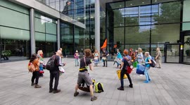 Extinction Rebellion drummers outside London office of major law firm Allen & Overy