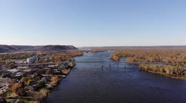 Bright sunny day in a small town with a river phone through it in the countryside on the eastern side of Minnesota along the Mississippi river