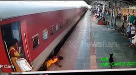 Incredible survival: Indian woman and child dragged under train that doesn't stop