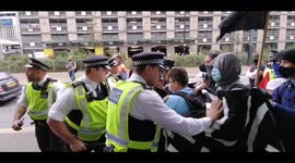 Scuffles between police and antifa trying to reach anti-immigration demo at UK immigration office in London's Croydon