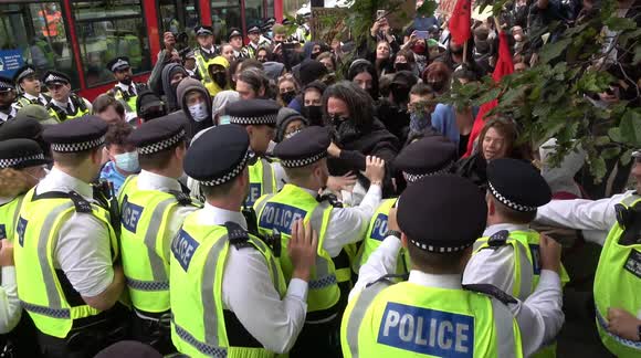 Scuffles as anti-fascist activists counter-protest anti-immigrant demo in Croydon, London