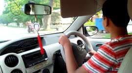 Thirteen-year-old boy drives father's car in India