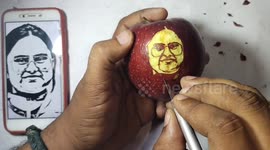 Artist karthik in south India carves the portrait of paralympic medal winner in an apple