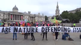 'We Are Nature Defending Itself' banner at the Impossible Rebellion March for Nature 2021 - Trafalgar Square