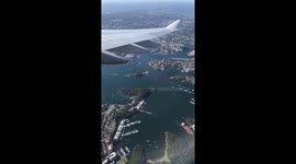 Sydney harbour view video from a plane window leaving the city