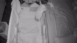 Funny moment baby pretends to be asleep when dad enters bedroom