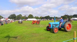 Vintage tractors paraded to hundreds of spectators at classic show in UK