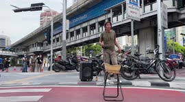 Busker sings protest rock song at anti-government rally in Bangkok, Thailand