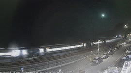 Train passing Dawlish as Meteorite captured on webcam shines bright over Devon, UK