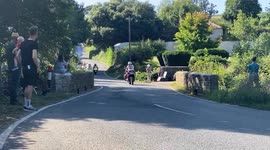 Tour of Britain cycle race stage 2 peloton at base of Farrant’s Hill near Dunsford Devon