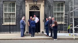 Families of victims from the Northern Ireland Troubles hand in a petition to 10 Downing Street