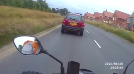Car not paying attention almost hits biker UK Dash Cam footage