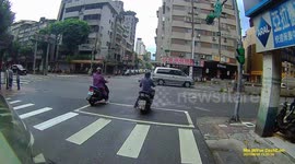 CLOSE CALL: Moped rider almost rides straight into traffic (Dashcam Video)