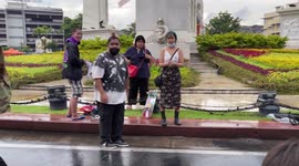 Skateboarders perform tricks at anti-government protest in Thailand