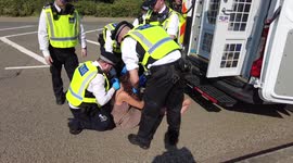 Superglued inside of a car, London police respond to protesters against Israeli arms dealings